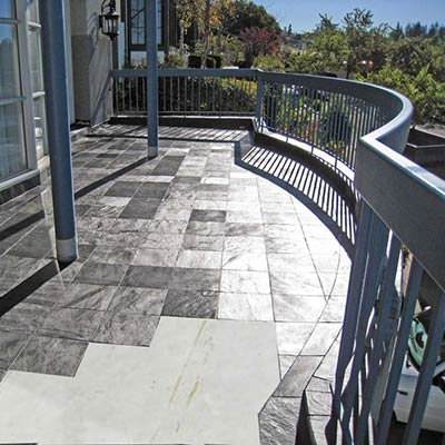 Elevated Tile Deck with Cut-out Showing Tiledek Membrane